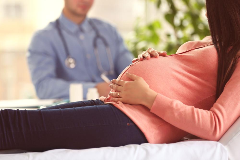 pregnant mom with obgyn doctor